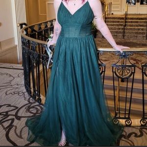 Hunter Green V-Neck Corset Top
Sweep Train Formal/ Prom Dress. Never worn!!